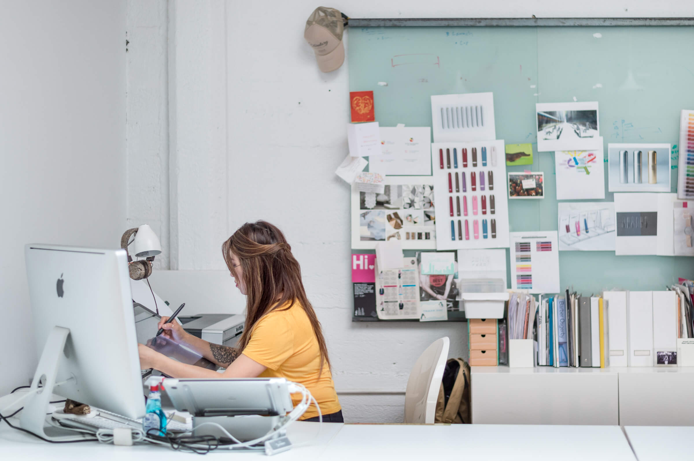 Ti Chang at her desk