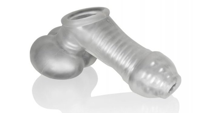 The Oxballs Sackjack up against a white background. The toy looks semi see-through, but the ribbing ridges inside the shaft and testicle portion can still be seen. There's a large hole at the base (that would go against the pelvic) and a smaller hole near the tip (which would align with the tip of the penis). | Kinkly Shop