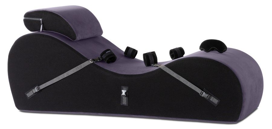 The Liberator Black Label Lyza Lounger Valkyrie in Aubergine purple up against a white background. The headrest and cuffs and blindfold are all shown alongside the shape itself. | Kinkly Shop