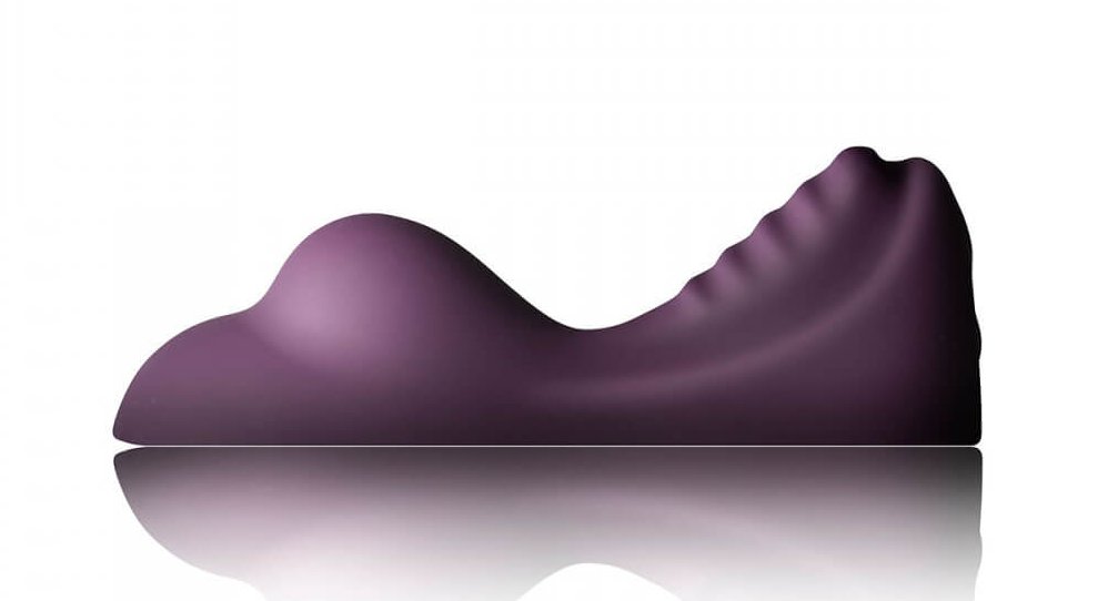 From-the-side view of the Rocks-Off Ruby Glow Dusk. This showcases the two swells of the toy to get vibrations in the right place. | Kinkly Shop