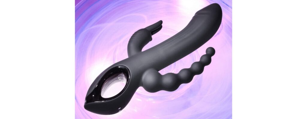 The Evolved Trifecta in front of a bright, colorful purple background. The purple swirls behind the vibrator. | Kinkly Shop