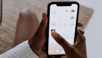 Close up of a person holding a smartphone.